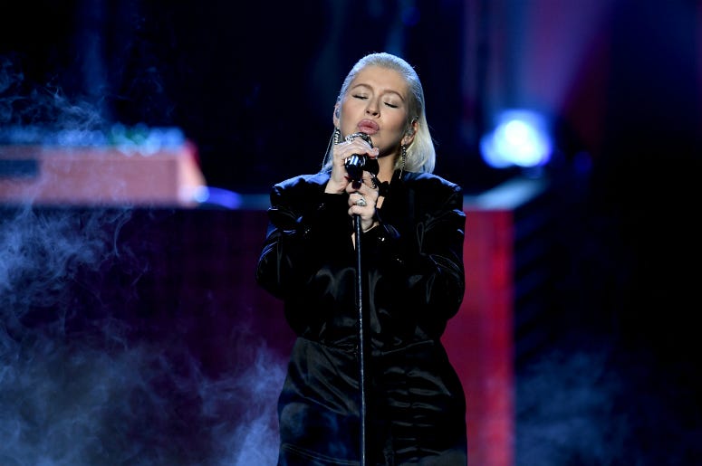 Christina Aguilera performs onstage during the 2017 American Music Awards Christina Aguilera performs onstage during the 2017 American Music Awards