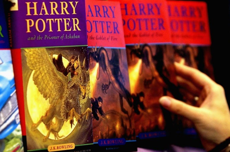 A woman looks at some of J.K Rowlings Harry Potter books in waterstones book store on June 16, 2003 in London. A woman looks at some of J.K Rowlings Harry Potter books in waterstones book store on June 16, 2003 in London.