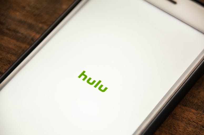 Vignette Selective Focus Apple iPhone 6+ with Hulu application showing on screen. Hulu is a streaming video app. Vignette Selective Focus Apple iPhone 6+ with Hulu application showing on screen. Hulu is a streaming video app.