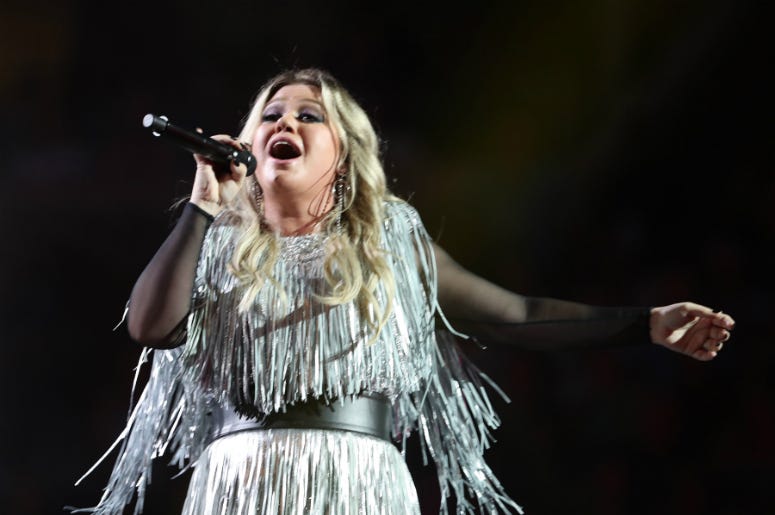 Singer-songwriter Kelly Clarkson performs during the opening night ceremony at Arthur Ashe Stadium during Day One of the 2018 US Open Tennis Championship Singer-songwriter Kelly Clarkson performs during the opening night ceremony at Arthur Ashe Stadium during Day One of the 2018 US Open Tennis Championship