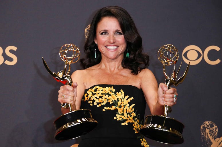 Los Angeles, CA, USA; Julia Louis-Dreyfus poses with her Emmy awards for Outstanding Actress in a Comedy Series and Outstanding Comedy Series for 'Veep,' in the trophy room during the 69th Emmy Awards at the Microsoft Theater