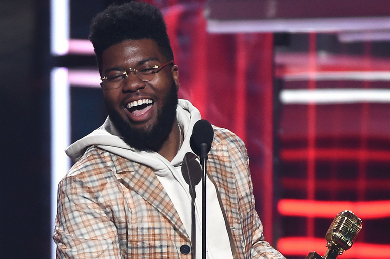 Khalid accepts the Top New Artist award at the 2018 Billboard Music Awards Khalid accepts the Top New Artist award at the 2018 Billboard Music Awards