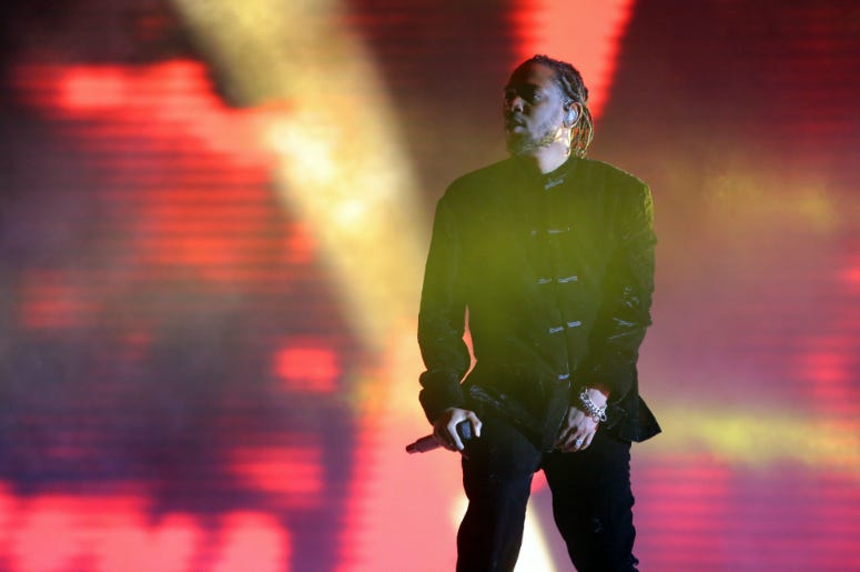 Kendrick Lamar performs during the 2017 Coachella Valley Music and Arts Festival at Empire Polo Club. Kendrick Lamar performs during the 2017 Coachella Valley Music and Arts Festival at Empire Polo Club.