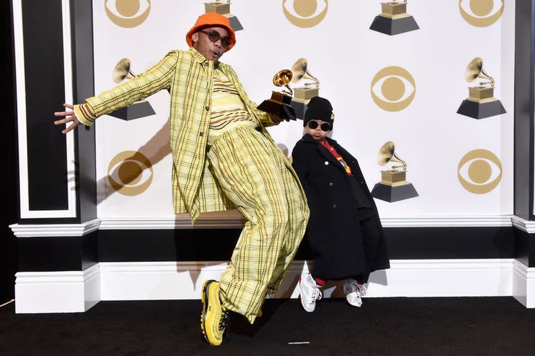 Anderson .Paak (L) and guest pose in the press room during the 61st Annual GRAMMY Awards at Staples Center on February 10, 2019 in Los Angeles, California Anderson .Paak (L) and guest pose in the press room during the 61st Annual GRAMMY Awards at Staples Center on February 10, 2019 in Los Angeles, California
