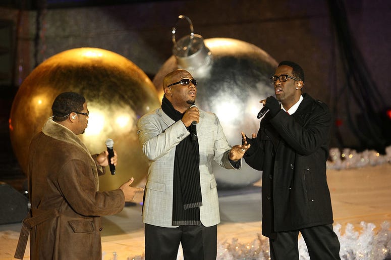 Boyz II Men perform on stage at the Rockefeller Center Christmas tree lighting Boyz II Men perform on stage at the Rockefeller Center Christmas tree lighting