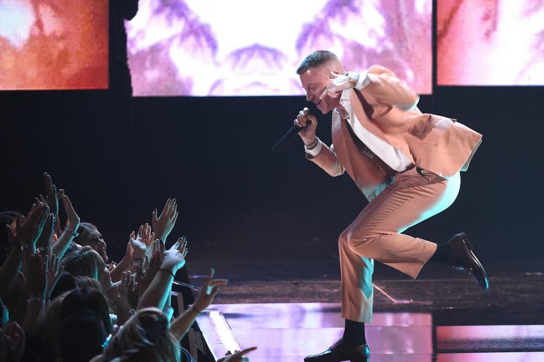 Macklemore performs at the 2017 American Music Awards Macklemore performs at the 2017 American Music Awards