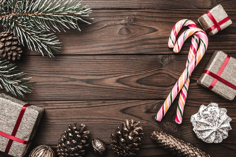 Fir tree, decorative cone, sweets, and gifts for holidays. Fir tree, decorative cone, sweets, and gifts for holidays.