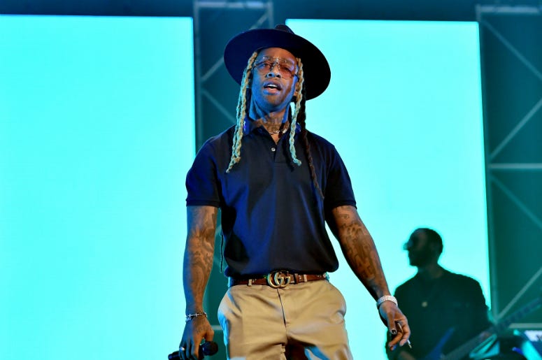 Ty Dolla $ign LOS ANGELES, CA - JUNE 22: Ty Dolla Sign performs with Ella Mai at 2018 BET Experience Staples Center Concert, sponsored by COCA-COLA, at L.A. Live on June 22, 2018 in Los Angeles, California.