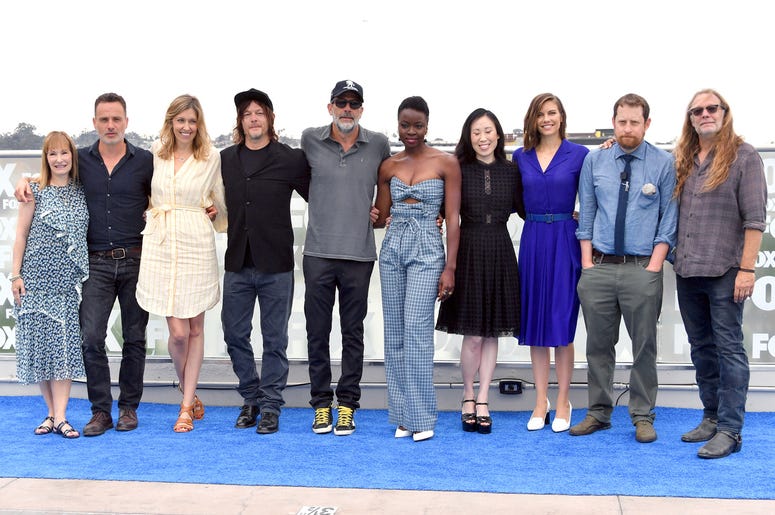 Cast of AMC's "The Walking Dead" at San Diego Comic-Con 2018 SAN DIEGO, CA - JULY 20: (L-R) Gale Ann Hurd, Andrew Lincoln, Denise M. Huth, Norman Reedus, Jeffrey Dean Morgan, Danai Gurira, Angela Kang, Lauren Cohan, Scott M. Gimple and Greg Nicotero attend 'The Walking Dead' Photo Call during Comic-Con Internationa