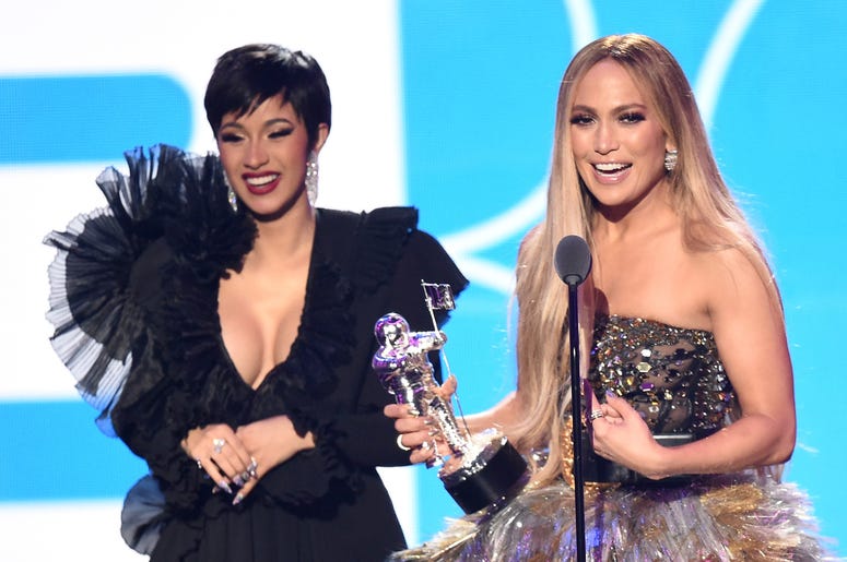 Cardi B and Jennifer Lopez NEW YORK, NY - AUGUST 20: Cardi B, Jennifer Lopez, and DJ Khaled (not pictured) accept the award for Best Collaboration onstage during the 2018 MTV Video Music Awards at Radio City Music Hall on August 20, 2018 in New York City. (Photo by Michael Loccisan