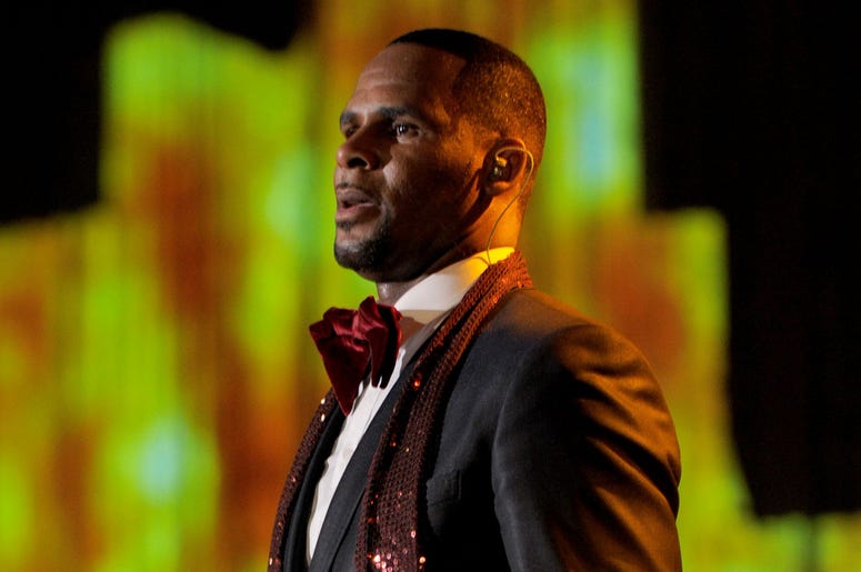 Singer R. Kelly BEVERLY HILLS, CA - FEBRUARY 12: Singer R. Kelly performs onstage at the 2011 Pre-GRAMMY Gala and Salute To Industry Icons Honoring David Geffen at Beverly Hilton on February 12, 2011 in Beverly Hills, California. (Photo by Larry Busacca/Getty Images)