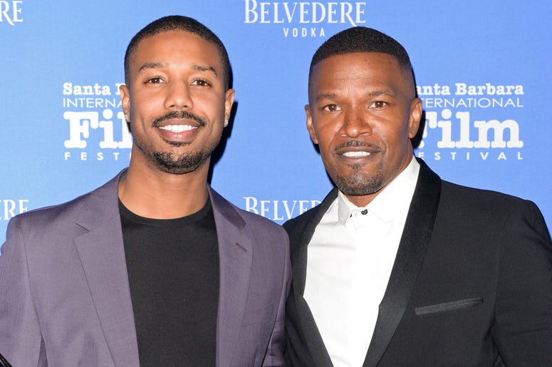 Michael B. Jordan and Jamie Foxx SANTA BARBARA, CALIFORNIA - FEBRUARY 07: Michael B. Jordan (L) and Jamie Foxx attend Belvedere Vodka Celebrates Michael B. Jordan's Cinema Vanguard Award at the 34th annual Santa Barbara International Film Festival on February 07, 2019 in Santa Barbara, C