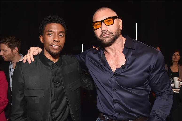 Chadwick Boseman and Dave Bautista LAS VEGAS, NV - APRIL 02: (L-R) Chadwick Boseman and Dave Bautista pose backstage at CinemaCon 2019 The State of the Industry and STXfilms Presentation at The Colosseum at Caesars Palace during CinemaCon, the official convention of the National Associatio