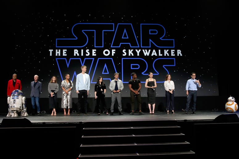 (L-R) Billy Dee Williams, Anthony Daniels, Keri Russell, Naomi Ackie, Joonas Suotamo, Kelly Marie Tran, Oscar Isaac, John Boyega, Daisy Ridley, Producer Kathleen Kennedy, and Director/producer/writer J.J. Abrams of 'Star Wars: The Rise of Skywalker' ANAHEIM, CALIFORNIA - AUGUST 24: (L-R) Billy Dee Williams, Anthony Daniels, Keri Russell, Naomi Ackie, Joonas Suotamo, Kelly Marie Tran, Oscar Isaac, John Boyega, Daisy Ridley, Producer Kathleen Kennedy, and Director/producer/writer J.J. Abrams of 'Star W