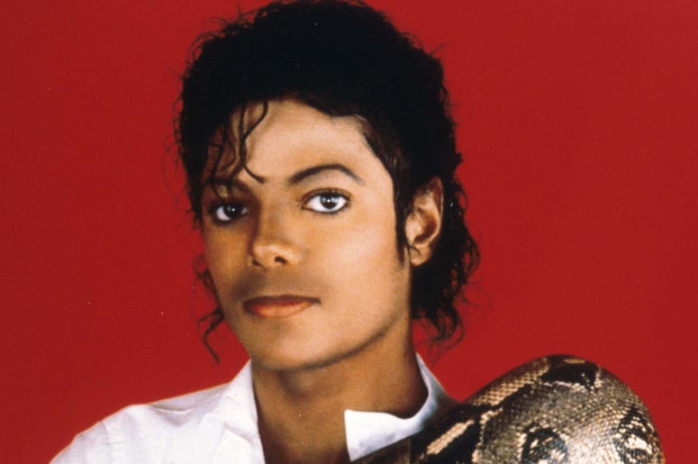 Michael Jackson Entertainer Michael Jackson poses with his pet boa constrictor September 15, 1987 in the USA. Jackson, who was the lead singer for the Jackson Five by age eight, reached the peak of his solo career with 1982''s 'Thriller,' the best-selling album of all ti