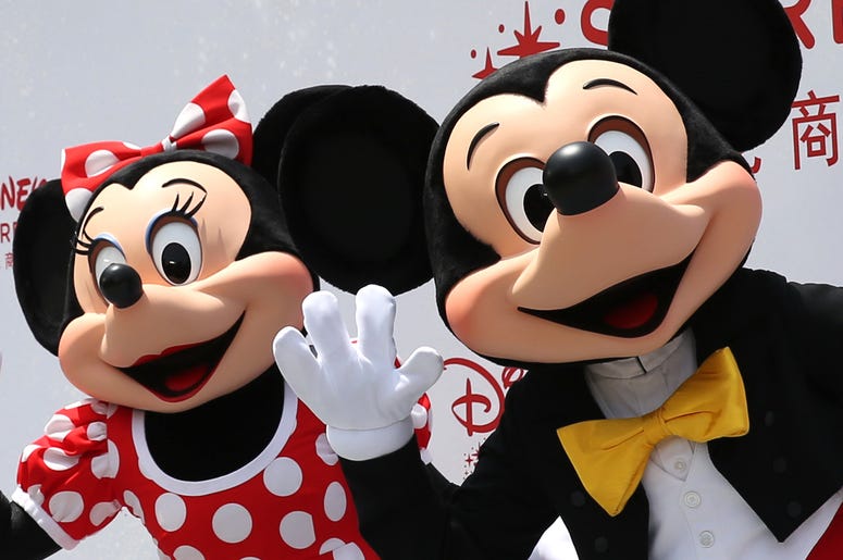 Minnie & Mickey Mouse (150520) -- SHANGHAI, May 20, 2015 (Xinhua) -- Disney characters Mickey (R) and Minnie Mouse are seen during the opening ceremony for the Disney flagship store in Shanghai, east China, May 20, 2015. The store, occupying an area of 5,860 square meters in t
