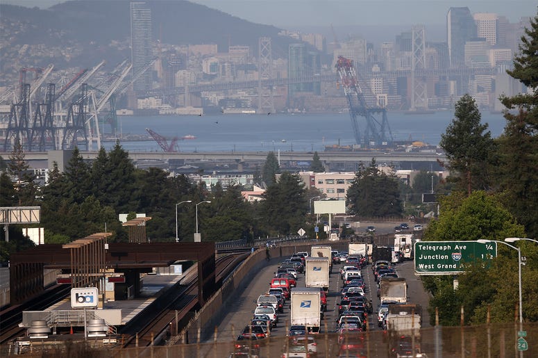 Westbound Highway 24 OAKLAND, CA - JULY 01: Traffic backs up on westbound highway 24 next to a Bay Area Rapid Transit (BART) station July 1, 2013 in Oakland, California. (Photo by Justin Sullivan/Getty Images)