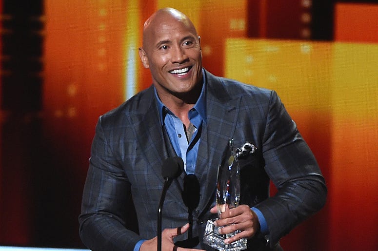 Dwayne "The Rock" Johnson LOS ANGELES - JANUARY 18: Dwayne "The Rock" Johnson accepts the "Favorite Premium Actor" award on the People's Choice Awards 2017 at the Microsoft Theater on January 18, 2017 in Los Angeles, California. (Photo by Frank Micelotta/PictureGroup)