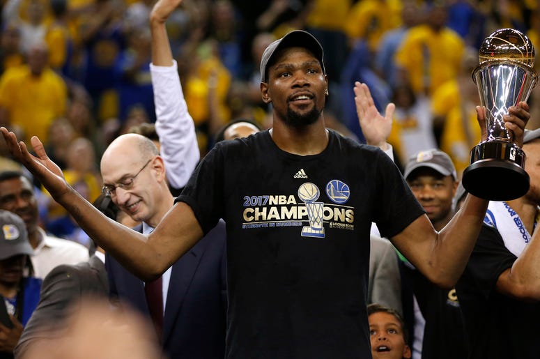 Kevin Durant The Golden State Warriors' Kevin Durant holds the Finals MVP trophy after defeating the Cleveland Cavaliers, 129-120, in Game 5 of the NBA Finals at Oracle Arena in Oakland, Calif., on Monday, June 12, 2017.