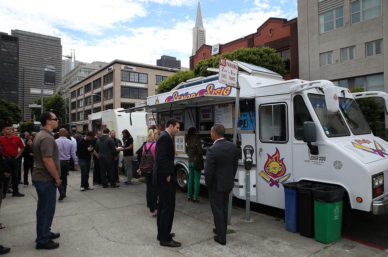 Señor Sisig Food Truck SAN FRANCISCO, CA - JULY 07: Customers line up to order food from the Senor Sisig food truck during an Off the Grid 'market' on July 7, 2014 in San Francisco, California. Popular San Francisco Bay Area food trucks are gathering at venues organzined by pla