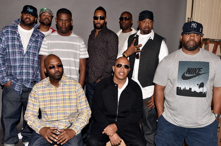 Wu-Tang Clan BURBANK, CA - OCTOBER 02: (L-R, standing) Rappers Ghostface Killah, Method Man, GZA, RZA, Inspectah Deck, Cappadonna, Raekwon, (L-R, seated), Masta Killa and U-God of the Wu-Tang Clan pose at a press conference to announce they have signed with Warner Bro