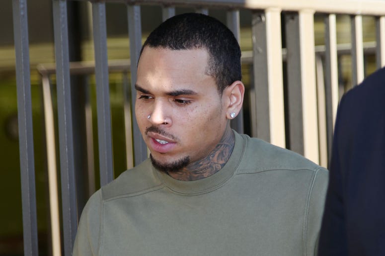 Chris Brown LOS ANGELES, CA - JANUARY 15: Singer Chris Brown attends a progress hearing at Los Angeles Superior Court on January 15, 2015 in Los Angeles, California. Brown was first placed on probation after the 2009 domestic violence case in which he plead guilty to