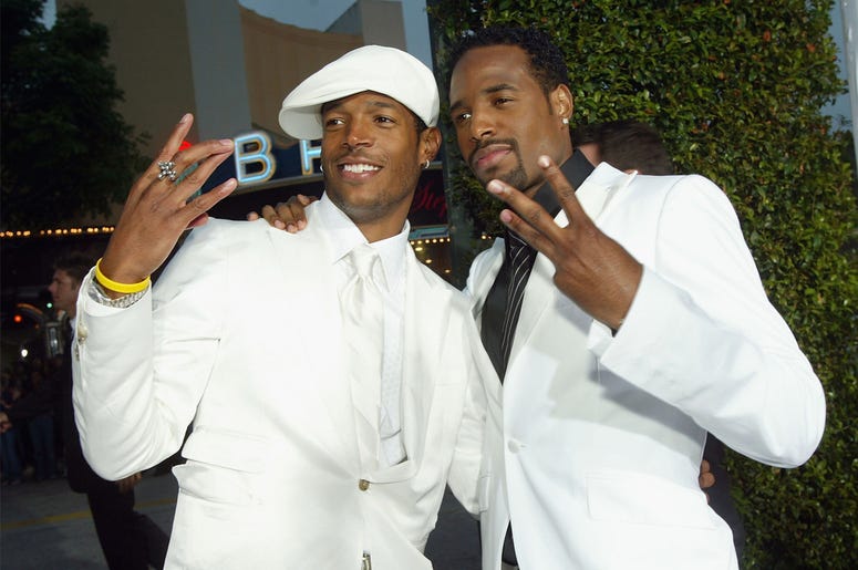 Marlon Wayans and Shawn Wayans LOS ANGELES - JUNE 16: Actors Marlon Wayans (L) and Shawn Wayans (R) arrive at the premiere of Revolution Studio's and Columbia Picture's "White Chicks" at the Village Theatre on June 16, 2004 in Los Angeles, California. (Photo by Kevin Winter/Getty Image