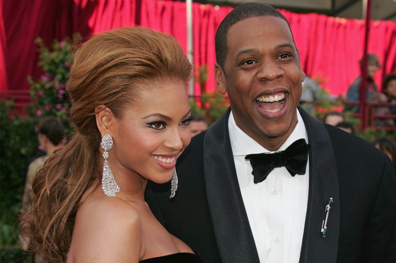 Beyoncé Knowles and husband Jay-Z HOLLYWOOD, CA - FEBRUARY 27: Singer Beyonce Knowles and rapper Jay-Z arrive at the 77th Annual Academy Awards at the Kodak Theater on February 27, 2005 in Hollywood, California. (Photo by Carlo Allegri/Getty Images)
