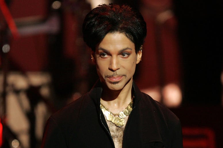 Prince Musician Prince is seen on stage at the 36th NAACP Image Awards at the Dorothy Chandler Pavilion on March 19, 2005 in Los Angeles, California. Prince was honored with the Vanguard Award. (Photo by Kevin Winter/Getty Images)