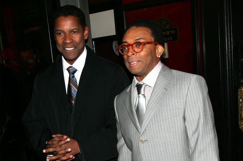 Actor Denzel Washington and Director Spike Lee NEW YORK - MARCH 20: Actor Denzel Washington and director Spike Lee attend Universal Pictures' premiere of "The Inside Man" at the Ziegfeld Theater March 20, 2006 in New York City. (Photo by Evan Agostini/Getty Images)