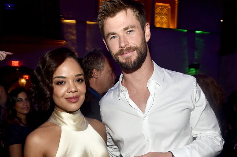 Tessa Thompson and Chris Hemsworth HOLLYWOOD, CA - OCTOBER 10: Actors Tessa Thompson (L) and Chris Hemsworth at The World Premiere of Marvel Studios' 'Thor: Ragnarok' at the El Capitan Theatre on October 10, 2017 in Hollywood, California. (Photo by Alberto E. Rodriguez/Getty Images for Dis