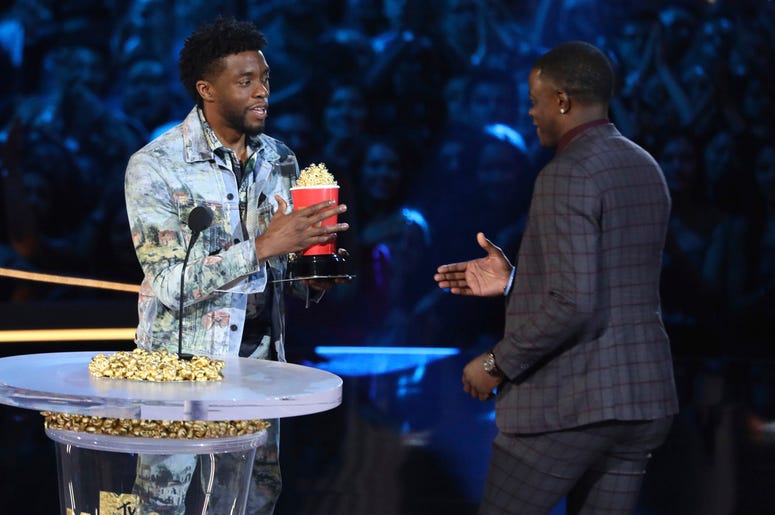 Chadwick Boseman, left, gives his best hero award for his role in "Black Panther" to James Shaw Jr. Chadwick Boseman, left, gives his best hero award for his role in "Black Panther" to James Shaw Jr.