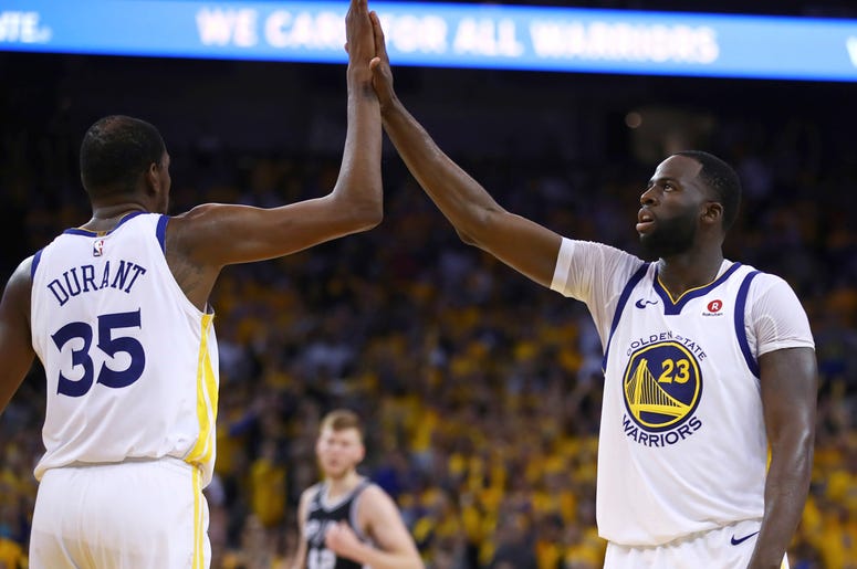 Golden State Warriors' Kevin Durant and Draymond Green Golden State Warriors' Kevin Durant and Draymond Green