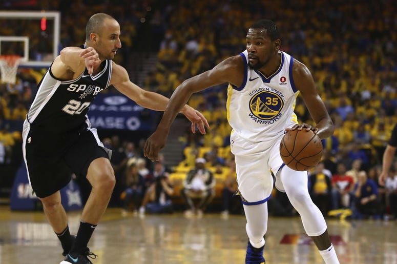 Golden State Warriors' Kevin Durant, right, drives the ball against San Antonio Spurs' Manu Ginobili Golden State Warriors' Kevin Durant, right, drives the ball against San Antonio Spurs' Manu Ginobili