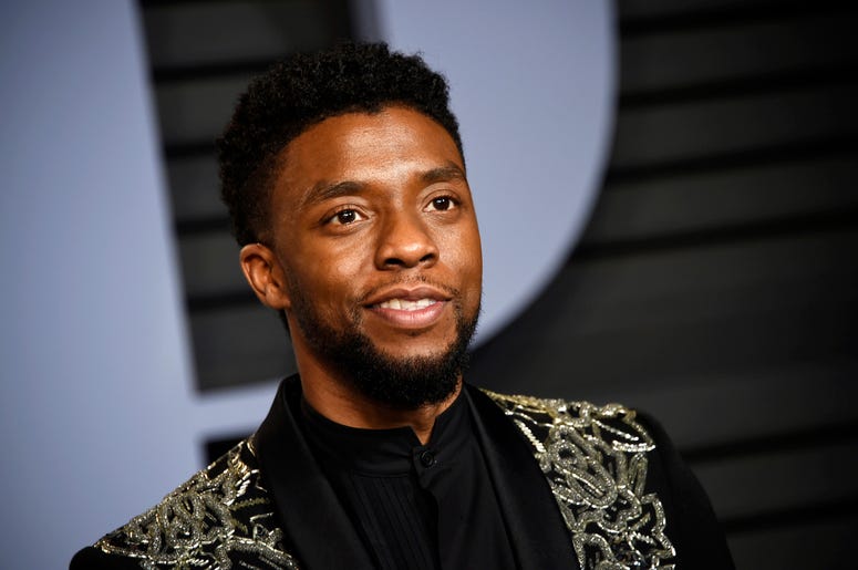 AP18192650797501 In this March 4, 2018 file photo, Chadwick Boseman arrives at the Vanity Fair Oscar Party in Beverly Hills, Calif. STX Entertainment announced Wednesday, July 11, 2018, that Boseman will star as a disgraced NYPD detective thrust into a citywide manhunt fo