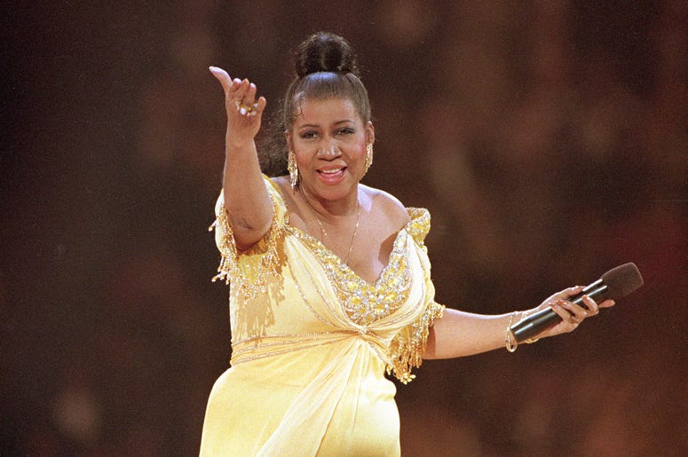 AP18228485289707 In this Jan. 19, 1993 file photo, singer Aretha Franklin performs at the inaugural gala for President Bill Clinton in Washington. Franklin died Thursday, Aug. 16, 2018 at her home in Detroit. She was 76. (AP Photo/Amy Sancetta, File)