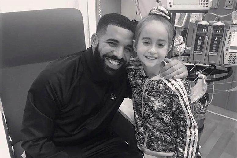 AP18233677315463 This Monday, Aug, 20, 2018 photo provided by the rapper Drake shows him posing with Sofia Sanchez, at Lurie Children's Hospital in Chicago. Drake surprised her after she recorded a video of herself dancing to the rapper's "In My Feelings" and invited him