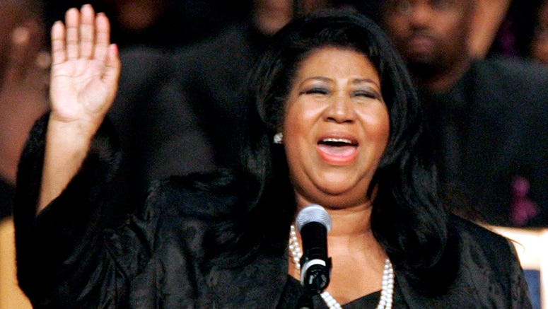 AP18239563685538 In this Nov. 2, 2005 file photo, Aretha Franklin sings during the funeral for civil rights pioneer Rosa Parks at the Greater Grace Temple in Detroit. Franklin died Aug. 16, 2018 of pancreatic cancer at the age of 76. (AP Photo/Carlos Osorio)