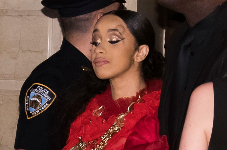 AP18251162417537 Cardi B, with a bump on her forehead, leaves after an altercation at the Harper's BAZAAR "ICONS by Carine Roitfeld" party at The Plaza on Friday, Sept. 7, 2018, New York. Nicki Minaj and Cardi B have been involved in an altercation that got physical at a