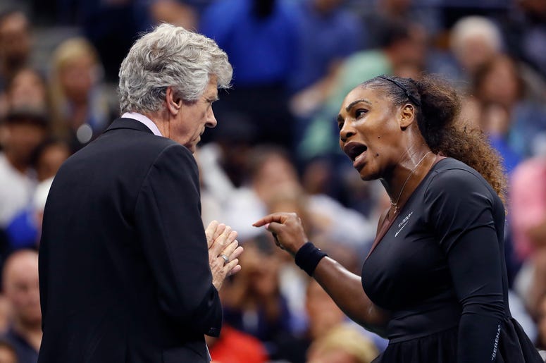 AP18251851404431 Serena Williams, right, talks with referee Brian Earley during the women's final of the U.S. Open tennis tournament against Naomi Osaka, of Japan, Saturday, Sept. 8, 2018, in New York. (AP Photo/Adam Hunger)