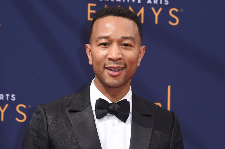 AP18256684432796 In this Sept. 9, 2018 file photo, John Legend arrives at the Creative Arts Emmy Awards in Los Angeles. Legend will become a coach on NBC’s “The Voice.” (Photo by Richard Shotwell/Invision/AP, File)