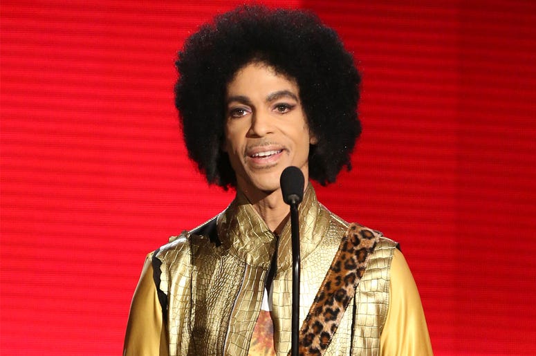 AP18303530437976 In this Nov. 22, 2015 file photo, Prince presents the award for favorite album - soul/R&B at the American Music Awards in Los Angeles. Ava DuVernay is making a multi-part documentary on Prince for Netflix with the support of the late musician’s estate. Th
