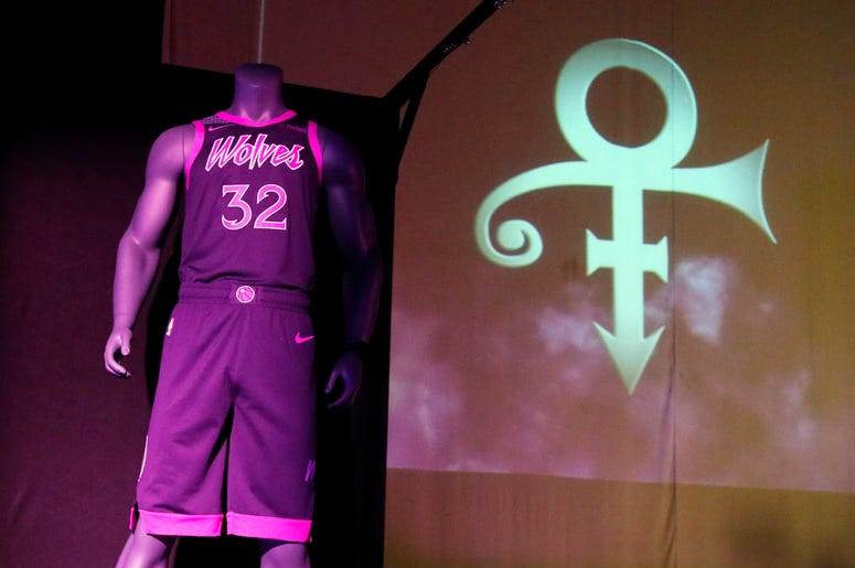 AP18305596074357 The new City Edition Minnesota Timberwolves uniform, honoring the legacy of the late rock star Prince, is unveiled Thursday, Nov. 1, 2018, in Chanhassen, Minn. The NBA basketball team is scheduled to wear the Prince-inspired uniforms eight times during th
