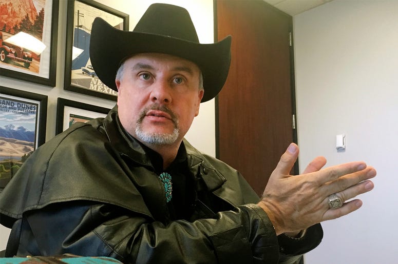 AP18334646004061 In this April 26, 2018 file photo, Gavin Clarkson of Lac Cruces, N.M., speaks at the Albuquerque bureau of The Associated Press. A District of Columbia clerk refused to accept Clarkson's state driver's license for a marriage license because she and her su