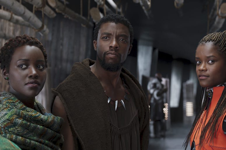 AP19004849789997 This file image released by Disney shows Lupita Nyong'o, from left, Chadwick Boseman and Letitia Wright in a scene from "Black Panther." The producers behind hits "Black Panther," "Crazy Rich Asians," "A Star Is Born" and "Bohemian Rhapsody" are among the
