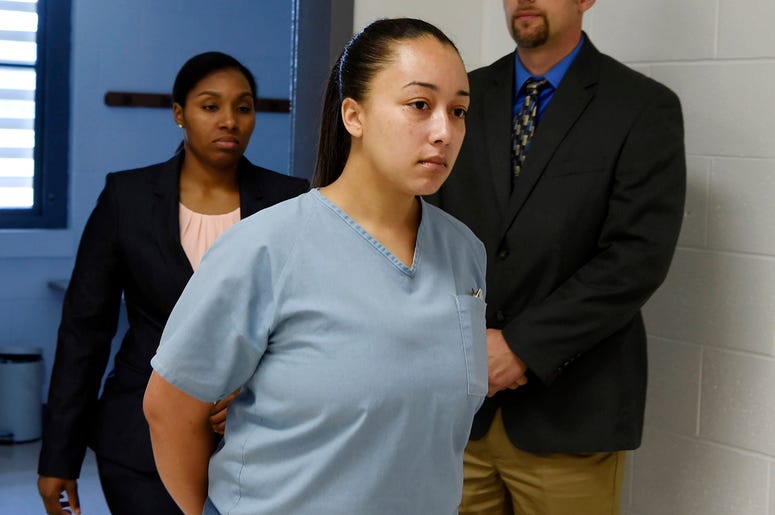 AP19007670044573 This May 23, 2018, file photo shows Cyntoia Brown, entering her clemency hearing at Tennessee Prison for Women in Nashville, Tenn. Tennessee Gov. Bill Haslam on Monday, Jan. 7, 2019, granted executive clemency to Brown, serving a life sentence for murder