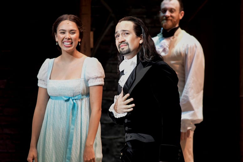 AP19012115690486 Lin-Manuel Miranda, composer and creator of the award-winning Broadway musical, Hamilton, receives a standing ovation with tears at the ending of the play's premiere held at the Santurce Fine Arts Center, in San Juan, Puerto Rico, Friday Jan. 11, 2019. Th