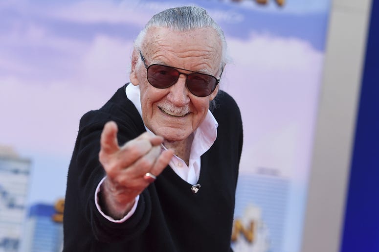 AP19030052466399 In this June 28, 2017 file photo, Stan Lee arrives at the Los Angeles premiere of "Spider-Man: Homecoming" at the TCL Chinese Theatre. For comics lovers, Lee was as much a superhero as the characters he helped create. Those fans, along with Lee's friends