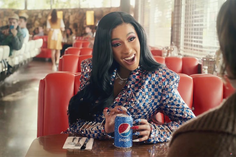 AP19030561475175 This screen grab from video provided by PepsiCo shows an image from the company's 2019 Super Bowl NFL football spot featuring Cardi B. Star power abounds in this year’s Super Bowl ads. (PepsiCo via AP)