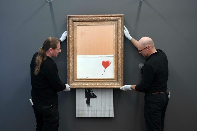 AP19035528354380 The shredded Banksy painting "Love is in the Bin 'is being exhibited at the Museum Frieder Burda in Baden-Baden Monday Feb. 4, 2019, where the work will be shown from Feb. 5 to March 3, 2019. It was originally titled 'Girl with Balloon' and since it destr